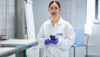 Samira Akbari, a female Stena Recycling employee in lab coat in the recycling lab at Stena Nordic Recycling Center.  